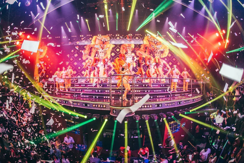 Vibrant live performance at Coco Bongo Show & Disco in Cancun, featuring world-class dancers, acrobats, and colorful lights.
